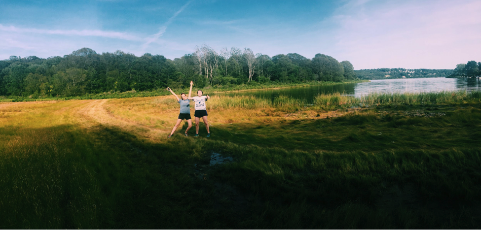 Avery Lowe and friend pose for a photo on the salt marsh between Mamacoke Island and the mainland. 