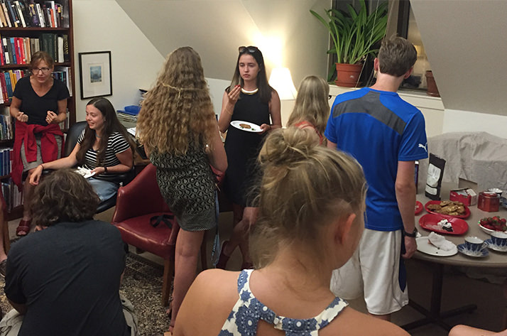 Slavic Studies students and faculty gather and chat. 