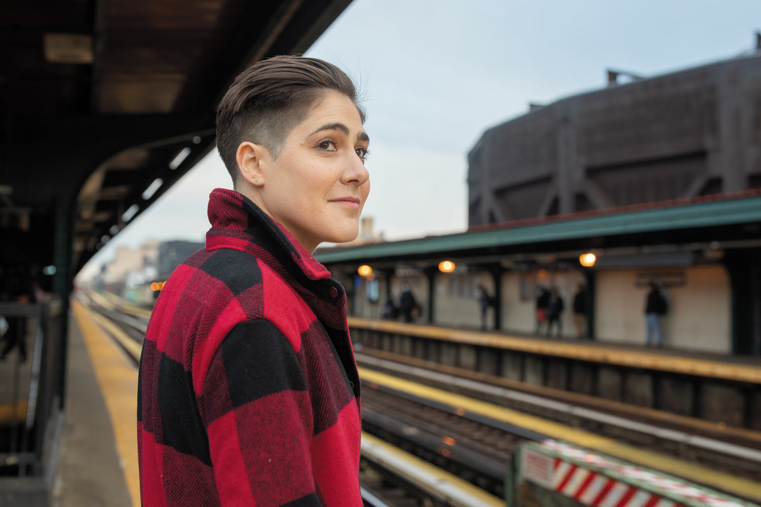 Image of Casey Corn ’10 waiting for a train