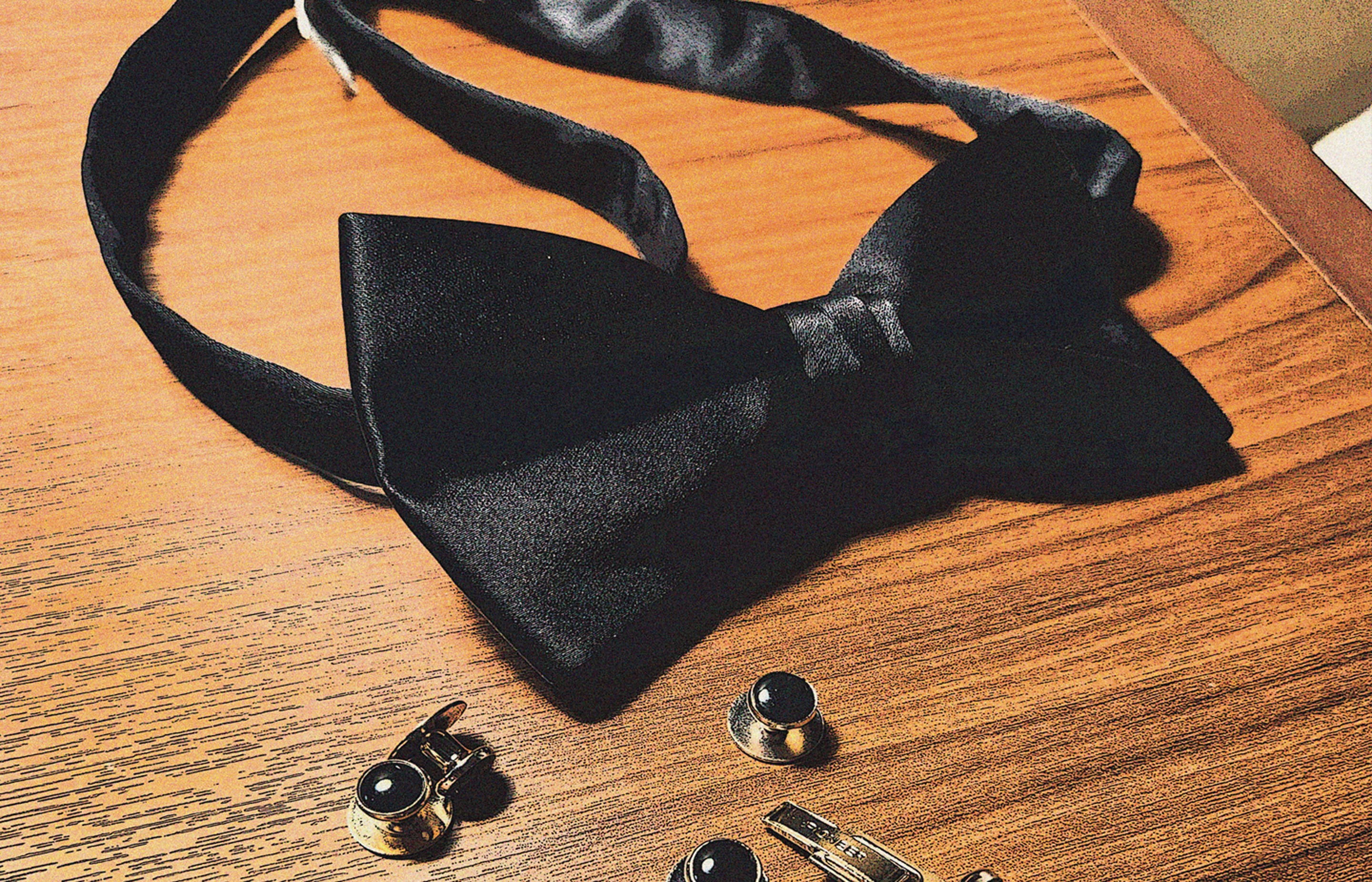 Abstract image of a bow tie and cuff links