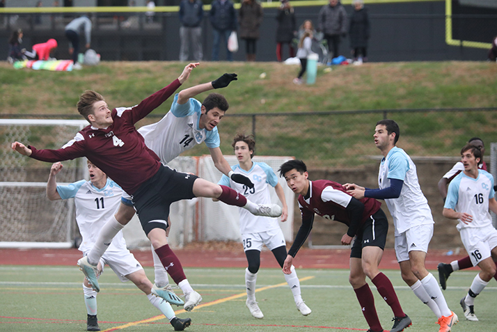 Two players collide mid-air