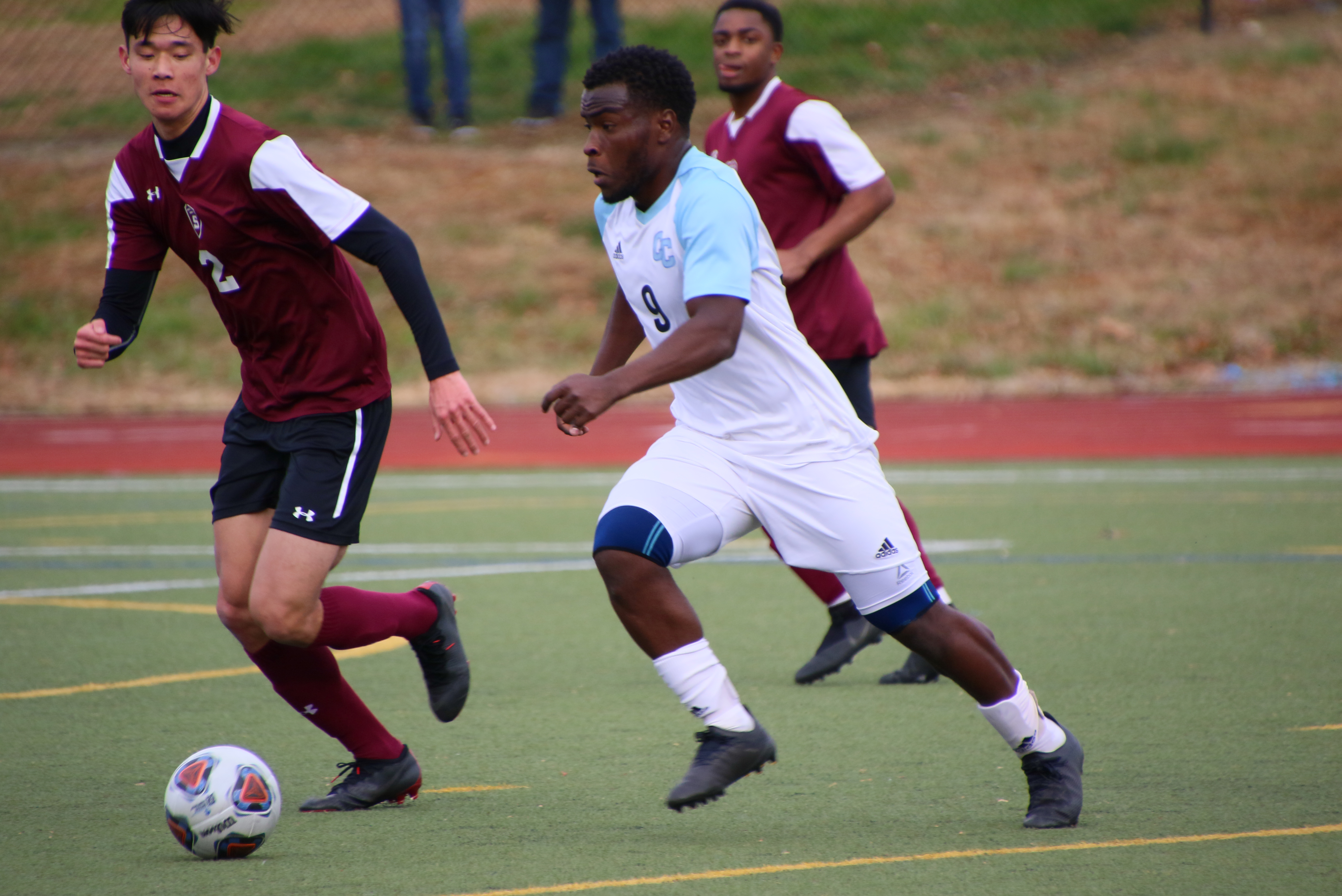 A Conn player tries to keep possession of the ball