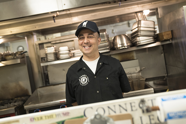 Catering Chef Luigi Sferrazza celebrates the Catering Department’s Team Service Excellence Award. 