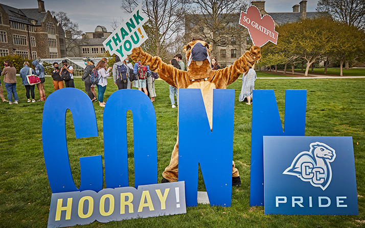 Camel Mascot in front of CONN Letters