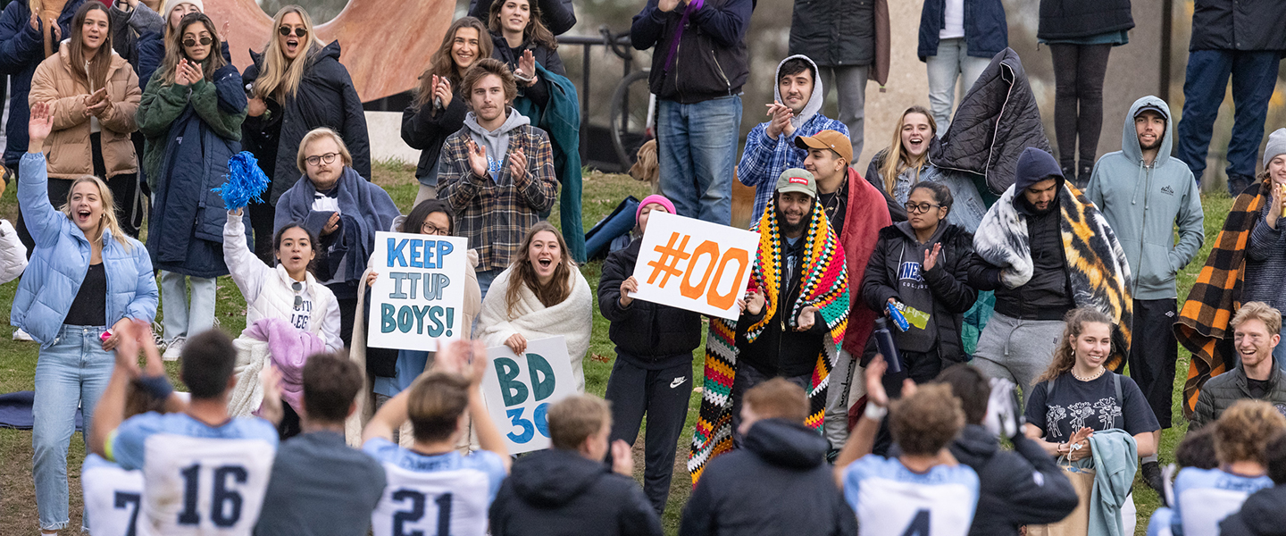 Fans cheer for the Camels after their win.