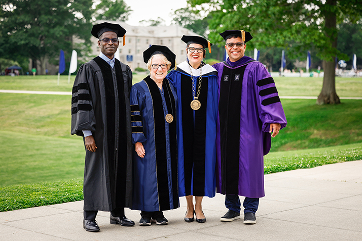 Keynote speaker Patrick Awuah, honorary degree recipient Linda Lear, President Katherine Bergeron and Board Chair Debo Adegbile.