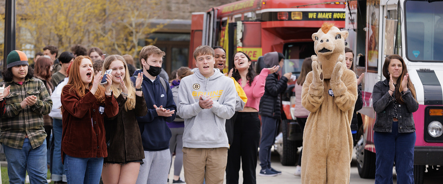 Students and the Camel cheer during Founders Day