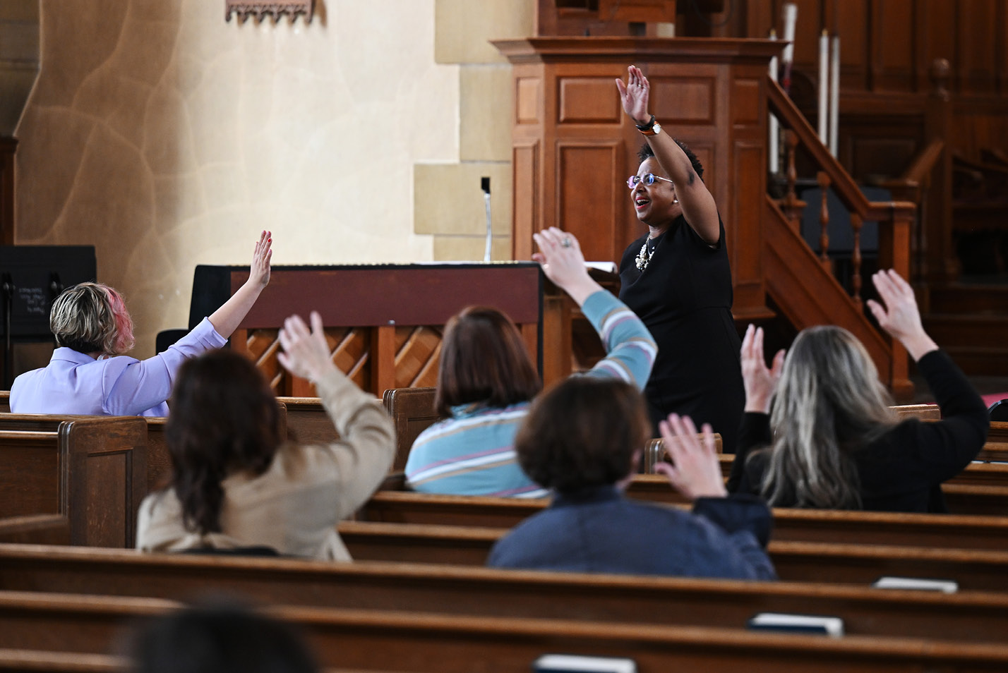 Persephone Hall leads the crowd at a Music in the Chapel event in February.