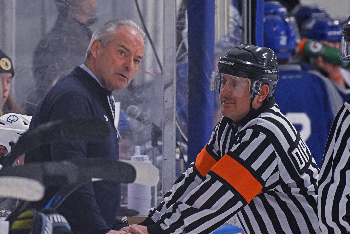 Men’s head coach Jim Ward gets an explanation from Referee Michael Dipasquale during a game against Assumption University.