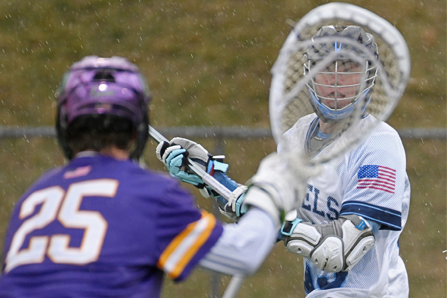 Connecticut College midfielder Connor Devir '26 in NESCAC men’s lacrosse action at Silfen Field.