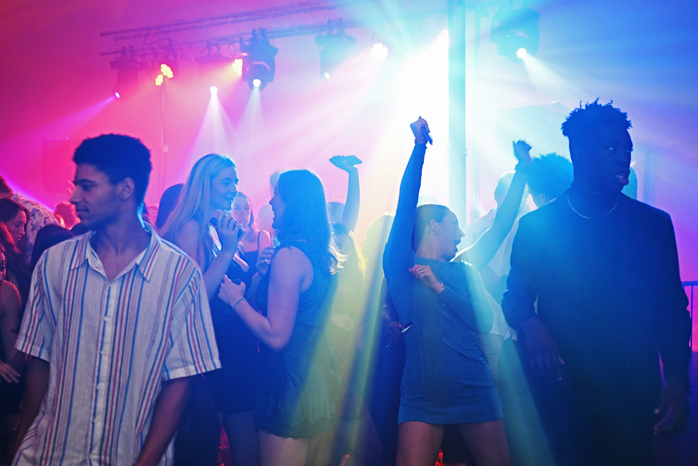 Students dance under the lights at the 2023 Fall Ball