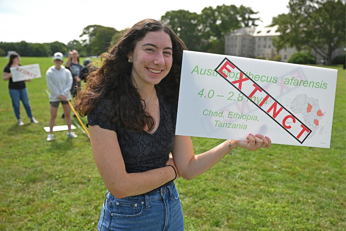 Anthropology class creates a giant timeline of human species on Tempel Green