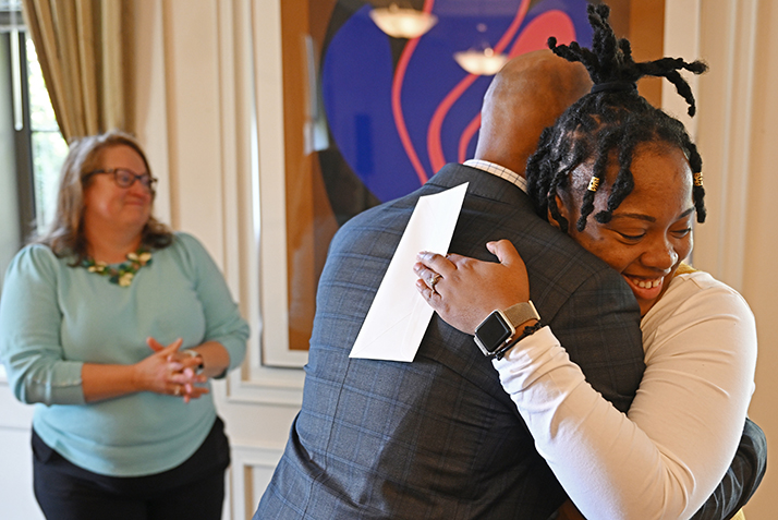 Jacquida Mars gets a hug from VP Reginald White