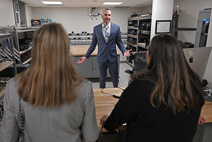 Professor Ross Morin leads a tour of the Stark Center for the Moving Image