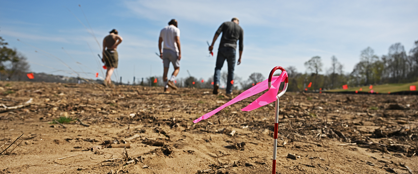 Associate Professor of Anthropology and College Archaeologist Anthony Graesch and field archaeology students Hannah Calaman ’24 and Will Poniros ’26 conduct a formal survey on a field adjacent to the lower athletic fields on April 28, 2023.