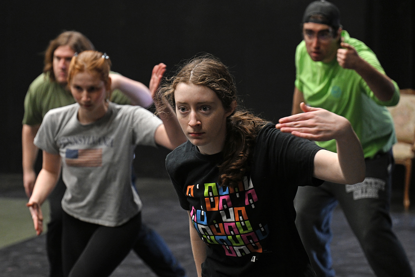 cast members rehearse choreography