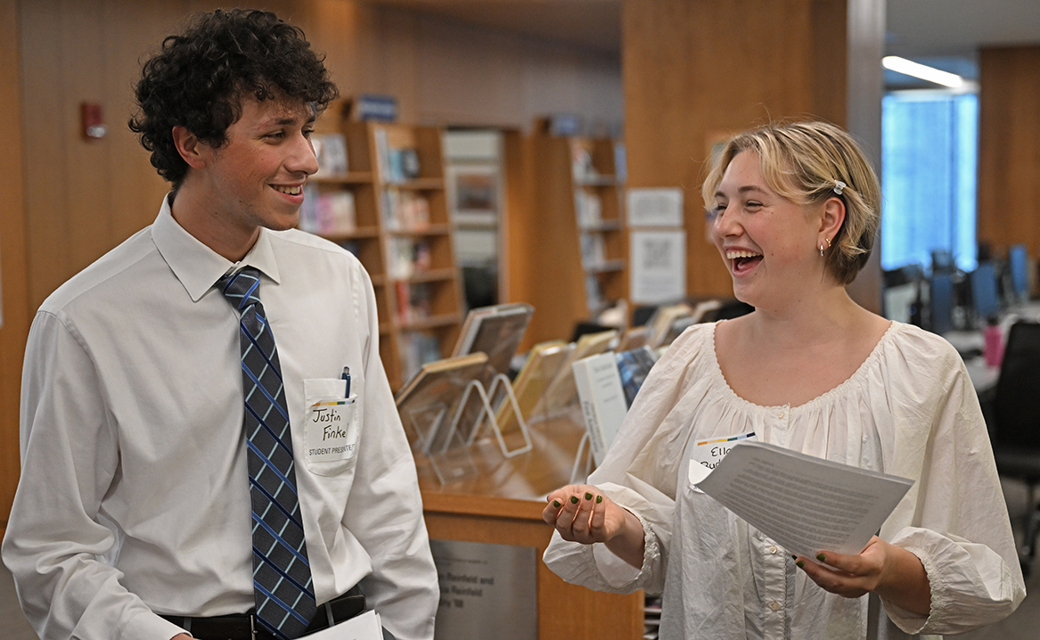 Justin Finkel ’25 and Ella Rudisill ’25 share a laugh before delivering their remarks at the celebratory event that concluded the sixth annual All-College Symposium.