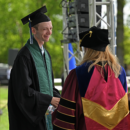 Skyler Kardell '25 accepts the Gaudiani Prize at Commencement.
